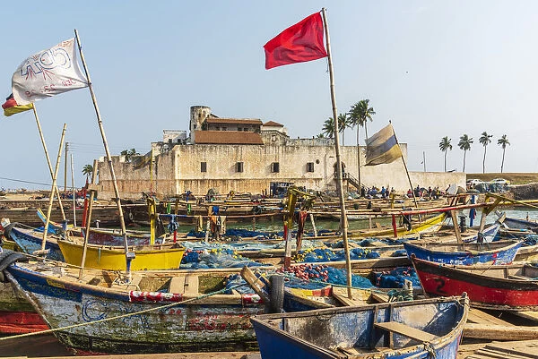 Africa, Ghana, Elmina harbour. Traditional wooden fishing boats in the harbour in