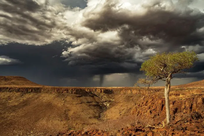 Framed Print : Africa, Namibia, Damaraland, Etendeka Plateau. A thunderstorm over the landscape Framed Print : Africa, Namibia, Damaraland, Etendeka Plateau. A thunderstorm over the landscape