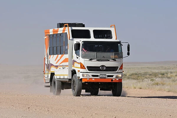 Africa, Namibia, Namib-Naukluft Park, Truck on a dusty road