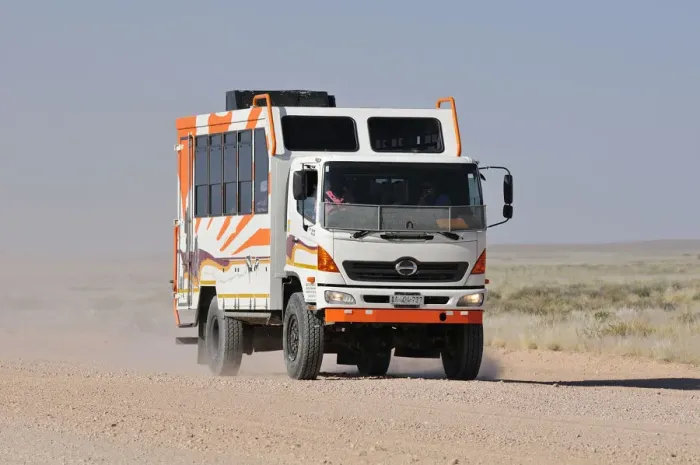 Framed Print : Africa, Namibia, Namib-Naukluft Park, Truck on a dusty road Framed Print : Africa, Namibia, Namib-Naukluft Park, Truck on a dusty road