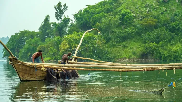 Framed Print : africa, Rwanda, Kivu Lake. Fishermen on traditional fishing boats in the middle of the lake near to an island Framed Print : africa, Rwanda, Kivu Lake. Fishermen on traditional fishing boats in the middle of the lake near to an island