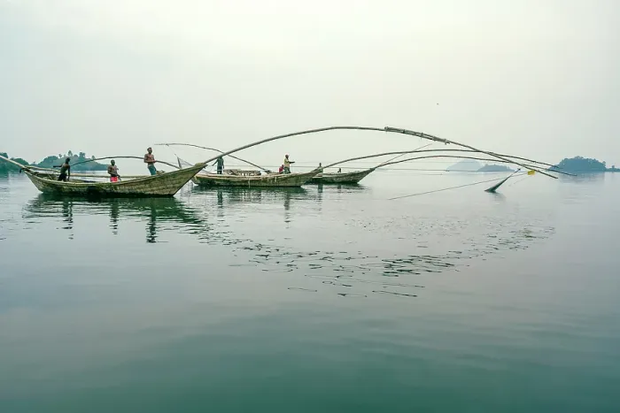 Framed Print : africa, Rwanda, Kivu Lake. Fishermen on traditional fishing boats in the middle of the lake near to some islands Framed Print : africa, Rwanda, Kivu Lake. Fishermen on traditional fishing boats in the middle of the lake near to some islands