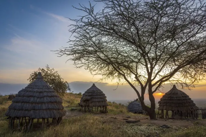 Framed Print : Africa, Uganda, Karamoja. Moroto. Dodoth village at the slopes of the Mount Moroto with the traditional buildings