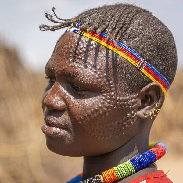 Africa, Uganda, Karamoja. Moroto. Portrait of a woman with scarification at Nakapelimoru