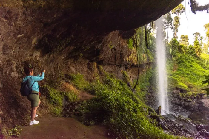 Framed Print : Africa, Uganda, Sipi Falls. A person taking pictures behind the falls Framed Print : Africa, Uganda, Sipi Falls. A person taking pictures behind the falls