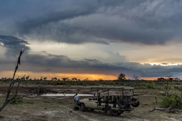 Framed Print : Africa, Zimbabwe, Hwange National park. A stop for a sundowner at a waterhole during Framed Print : Africa, Zimbabwe, Hwange National park. A stop for a sundowner at a waterhole during