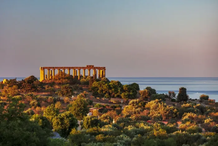 Framed Print : Agrigento, Sicily. Concordia Temple in the Valley of Temples at sunrise with the sea in Framed Print : Agrigento, Sicily. Concordia Temple in the Valley of Temples at sunrise with the sea in