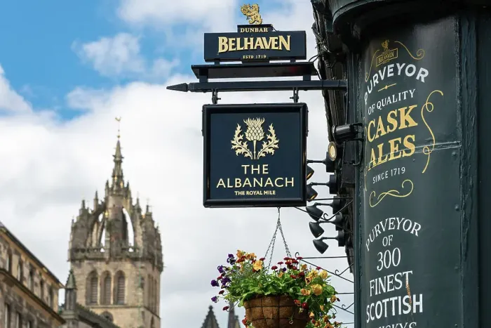 Framed Print : The Albanach pub on Royal Mile with tower of St. Giles Cathedral in background, UNESCO, Old Town, Edinburgh, Lothian, Scotland, UK