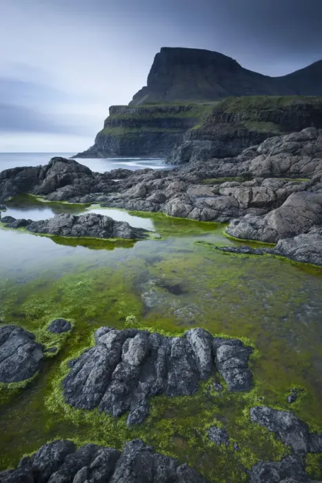 Framed Print : Algae lined rockpools on the coast at Gasadalur on the island of Vagar, Faroe Islands Framed Print : Algae lined rockpools on the coast at Gasadalur on the island of Vagar, Faroe Islands