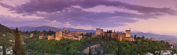 The Alhambra Palace illuminated at dusk, Granada, Granada Province, Andalucia, Spain