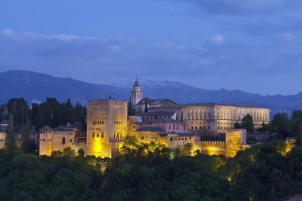 The Alhambra Palace illuminated at dusk, Granada, Granada Province, Andalucia, Spain