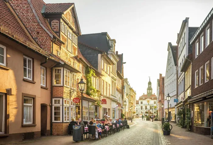 Framed Print : Alley in the old town with view to the town hall, Luneburg, Lower Saxony, Germany Framed Print : Alley in the old town with view to the town hall, Luneburg, Lower Saxony, Germany