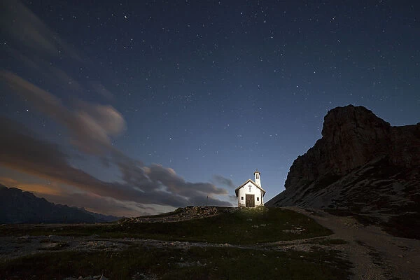 The alpine church of Locatelli refuge, with Sasso di Sesto in the background, Dolomites
