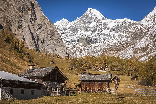 Alpine huts in Koednitztal with Grossglockner (3, 798 m), Kals am Grossglockner, East Tyrol, Austria