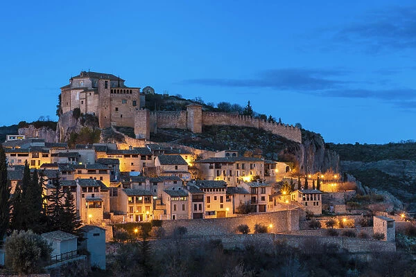 Alquezar village and Colegiata de Santa Mar√≠a la Mayor at dusk. Alquezar, Huesca, Spain