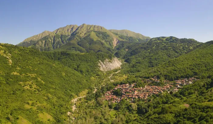 Framed Print : The Alto Mountain and little town of Sassalbo insummer day, municipality of Fivizzano