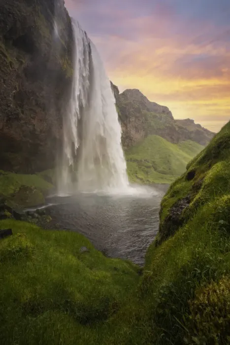 Framed Print : an amazing colorful sunset at Seljalandsfoss waterfall, Sudurland, Iceland