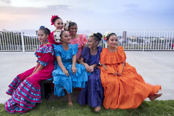 Americas, Central America, Nicaragua, Managua, a group of young girls seated before a