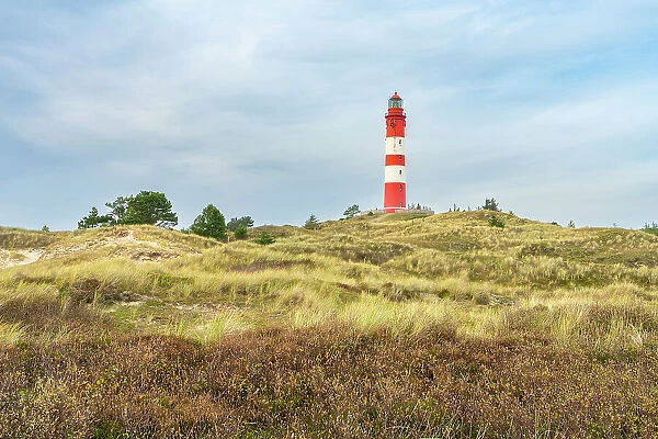 Amrum lighthouse against sky, Nebel, Amrum island, Nordfriesland, Schleswig-Holstein, Germany