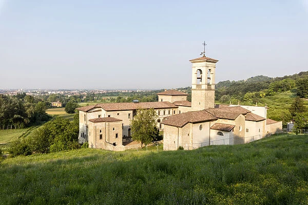 The ancient monastery of Astino surrounded by green hills, Longuelo, Province of Bergamo