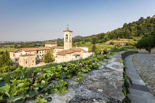 The ancient monastery of Astino surrounded by green hills, Longuelo, Province of Bergamo