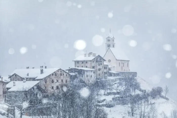 Framed Print : the ancient village of Colle Santa Lucia with the church on the hill under a snowfall Framed Print : the ancient village of Colle Santa Lucia with the church on the hill under a snowfall