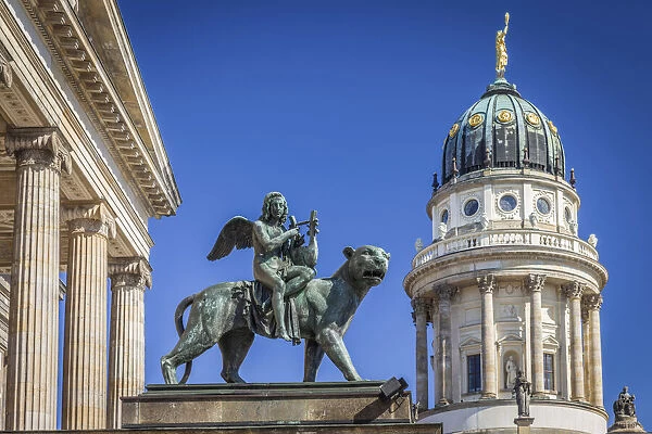 Angel statue on lion at Berlin Concert Hall and French Cathedral, Gendarmenmarkt, Berlin