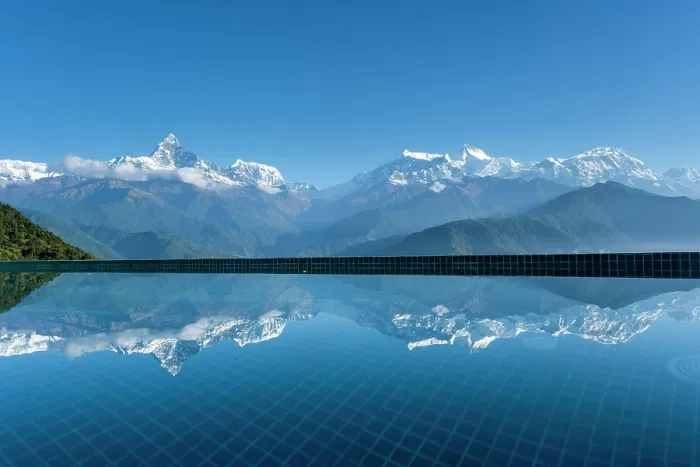 Framed Print : Annapurna mountain range reflected in hotel pool at Sarangkot near Pokhara, Annapurna Region, Gandaki Province, Nepalswimming pool Framed Print : Annapurna mountain range reflected in hotel pool at Sarangkot near Pokhara, Annapurna Region, Gandaki Province, Nepalswimming pool