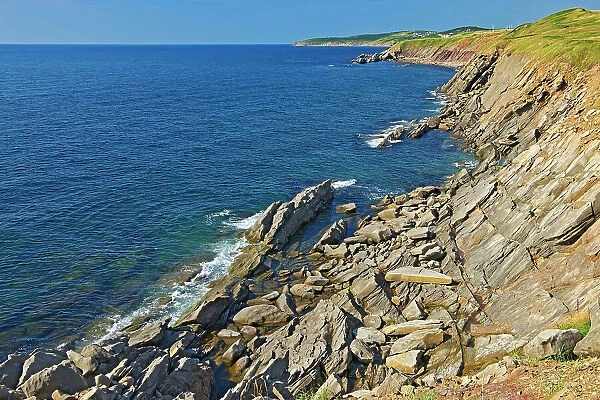 Appalachain Mountains chain and rocky shoreline along the Gulf of St. Lawrence. Cape Breton Island. Cabot Trail. Nova Scotia, Canada