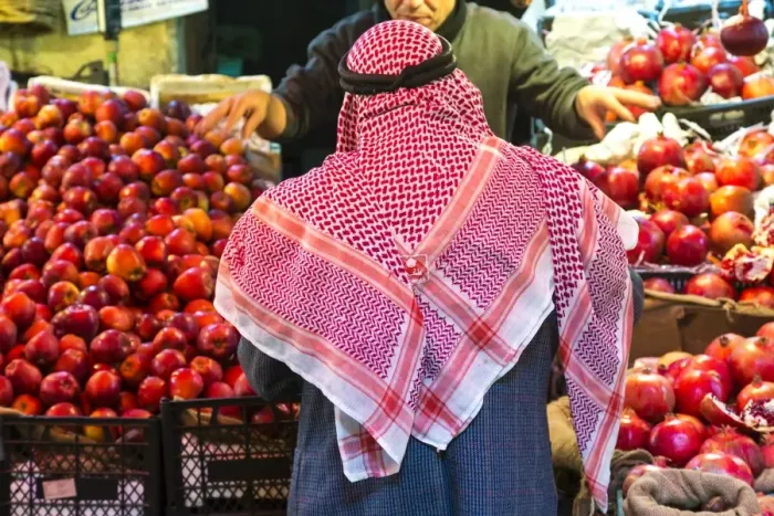 Framed Print : Arab man waerinf Keffiyeh buying apples in market, Amman, Jordan Framed Print : Arab man waerinf Keffiyeh buying apples in market, Amman, Jordan