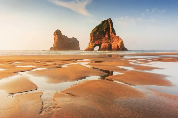 Framed Print : Archway sea stacks in the Tasman sea at Wharariki beach, Nelson, South Island Framed Print : Archway sea stacks in the Tasman sea at Wharariki beach, Nelson, South Island