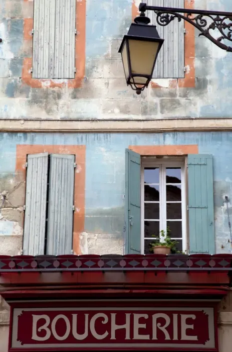Framed Print : Arles; Bouches du Rhone, France; Sign of a butchers shop and a brightly painted facade