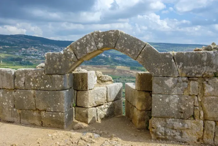 Framed Print : An arrowslit at Nimrod fortress (Qal at al-Subeiba) overlooking the village of Framed Print : An arrowslit at Nimrod fortress (Qal at al-Subeiba) overlooking the village of