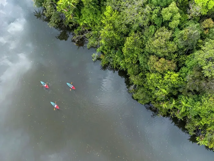 Framed Print : Asia, Cambodia, Cardamom Mountains, Botum Sakor National Park. Aerial shot of kayaks on the Preak Tachan river near Cardamom Tented Camp ecolodge
