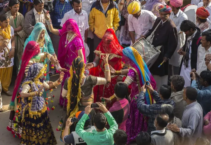 Framed Print : Asia, India, Rajasthan, Jaisalmer, desert festival, women dancing during parade Framed Print : Asia, India, Rajasthan, Jaisalmer, desert festival, women dancing during parade