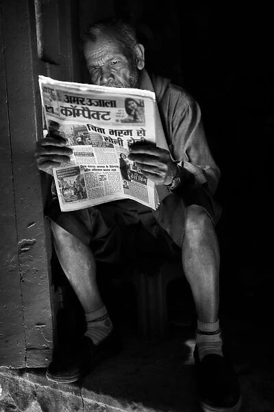 Asia, India, Uttar Pradesh, Varanasi district. Reader