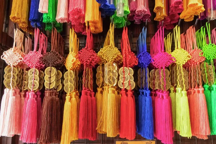 Framed Print : Asia, Singapore, Chinatown, Souvenir Shop display of Colourful Good Luck Knots Framed Print : Asia, Singapore, Chinatown, Souvenir Shop display of Colourful Good Luck Knots