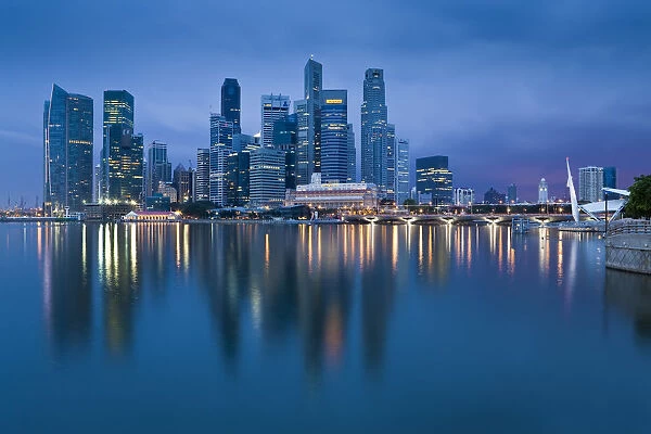 Asia, Singapore, Singapore Skyline and Financial district under gathering storm clouds