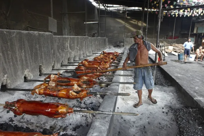 Framed Print : Asia, South East Asia, Philippines, Manila, spit roast piglet (lechon) Framed Print : Asia, South East Asia, Philippines, Manila, spit roast piglet (lechon)