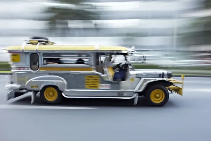 Framed Print : Asia, South East Asia, Philippines, Manila, a jeepney speeding through Makati Framed Print : Asia, South East Asia, Philippines, Manila, a jeepney speeding through Makati