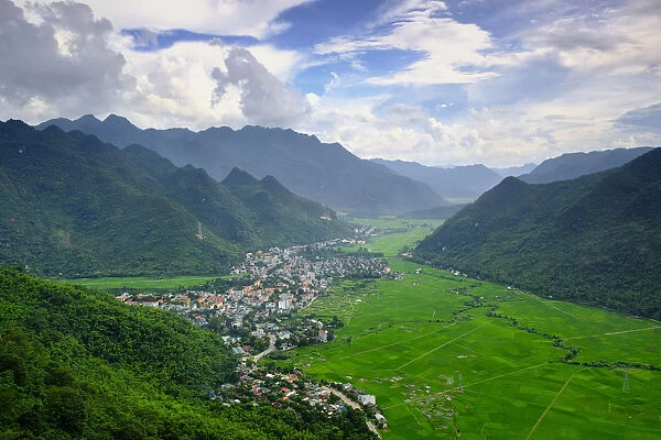 Asia, South East Asia, Vietnam, Mai Chau, elevated view of rice paddies and the town