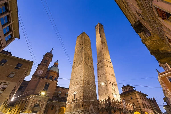 Asinelli and Garisenda towers in Bologna at twilight. Bologna, Emilia Romagna, Italy