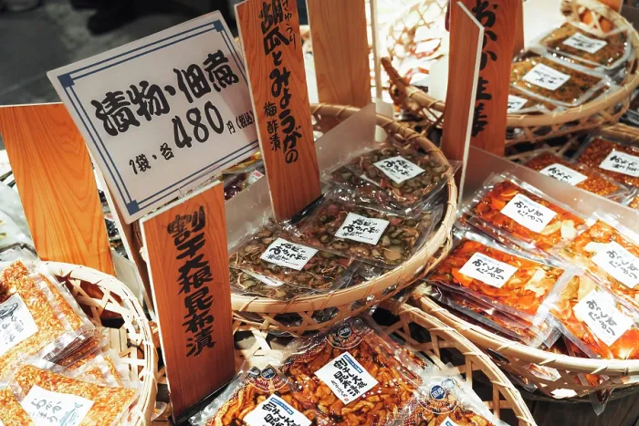 Framed Print : Assorted Japanese pickles (tsukemono) are displayed in baskets for sale in Tokyo