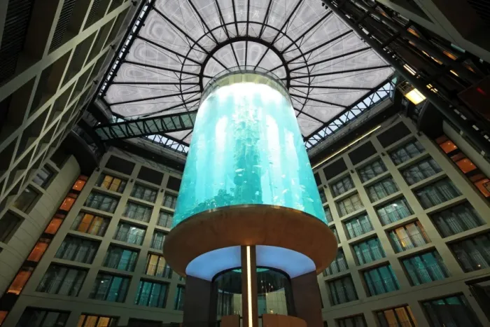 Framed Print : Atrium of the DomAquar e Hotel with a massive aquarium in the middle. Berlin, Germany Framed Print : Atrium of the DomAquar e Hotel with a massive aquarium in the middle. Berlin, Germany
