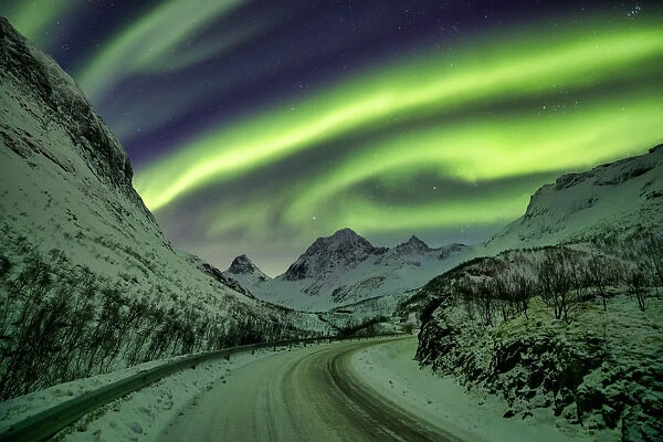 Aurora Borealis over Mountain Road in Winter, Senja, Norway