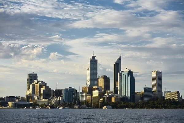 Australia, Western Australia, Perth. View across the Swan River to the city skyline at dusk