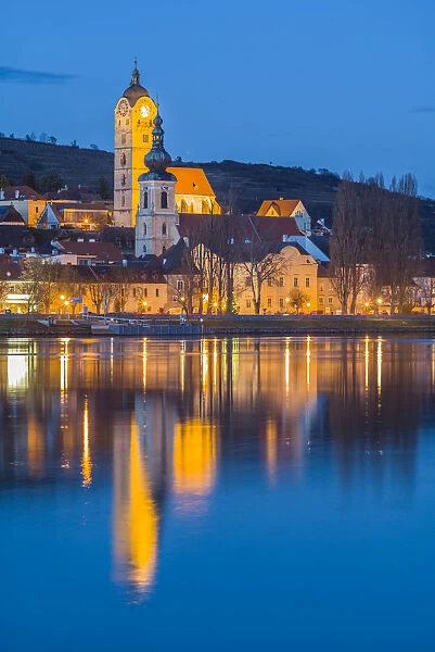 Austria, Lower Austria, Stein an der Donau, town view from the Danube River, dusk