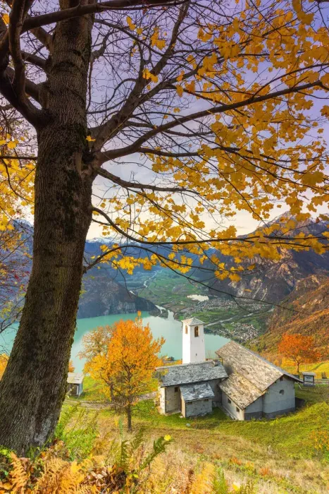 Framed Print : Autumn colors at the Foppaccia church at sunset with view on the Novate Lake and valley Framed Print : Autumn colors at the Foppaccia church at sunset with view on the Novate Lake and valley