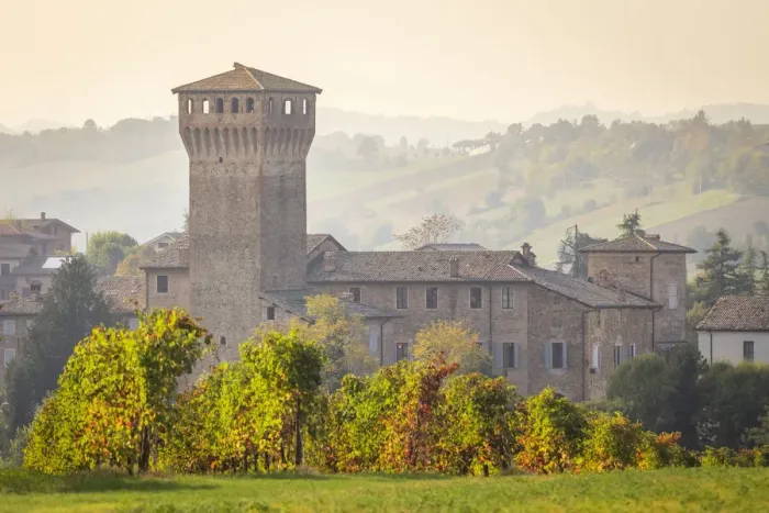 Framed Print : Autumnal view of the castle and vineyards of Levizzano Rangone Framed Print : Autumnal view of the castle and vineyards of Levizzano Rangone