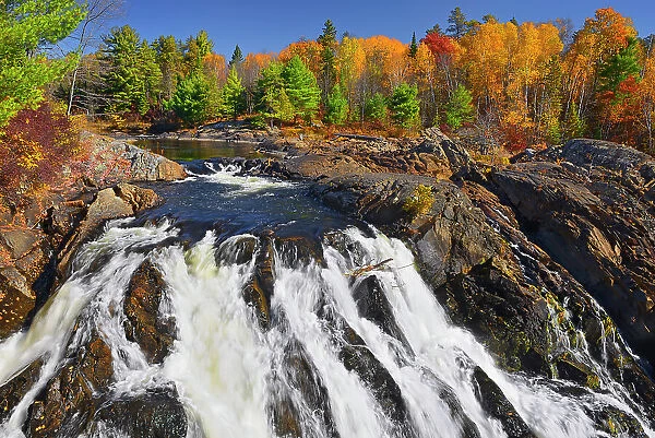 Aux Sables River flows into a waterfall near Massey Chutes Provincial Park, Ontario, Canada